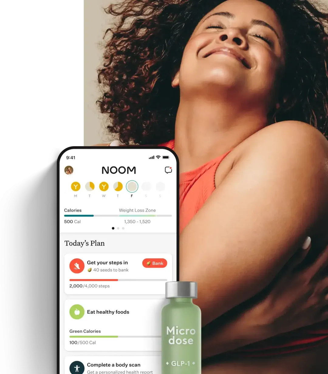 woman smiling with a noom vial, orange pill, and the noom app </p>
<p>